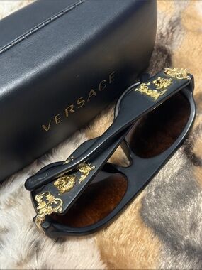 Versace Black Frame Sunglasses with Gold Medusa Accents and Brown Lenses